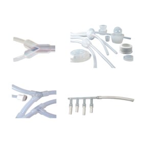 Assortment of single‑use bioprocessing tubing connectors and molded fluid handling components used in sterile assemblies.