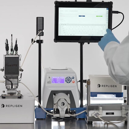 Repligen KrosFlo RPM system with FlowVPX sensor and tablet interface used for real‑time tangential flow filtration process monitoring.
