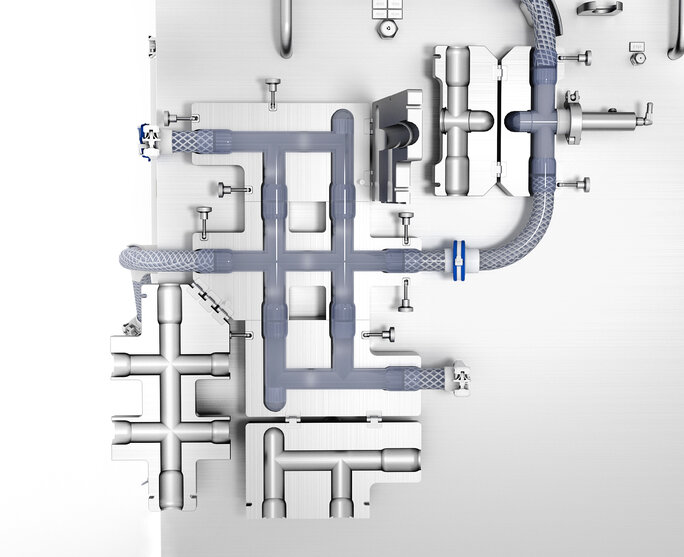 Opened valve block with injection-molded manifolds on KRM 40 Chromatography System